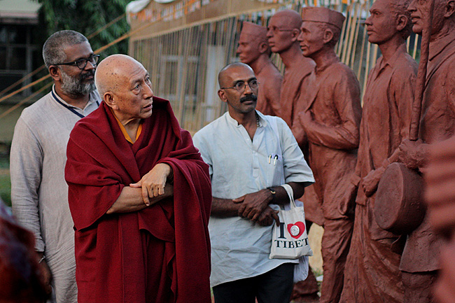 Venerable Prof Samdhong Rinpoche, Former Prime Minister of Tibetan Government in Exile examines life-size sculptures of 1930 Salt Satyagrahis made by Sculptors from India and abroad. yEeldtho Mathew, Founding Member of Friends of Tibet Foundation for the Wellbeing and Sethu Das, Coordinator, Dandi Memorial Project next to him. Prof Rinpoche observed that 'these sculptures are not mere works of art alone, they are more of an expression of gratitude to the Mahatma and the unsung heroes of Dandi Salt Satyagraha.'