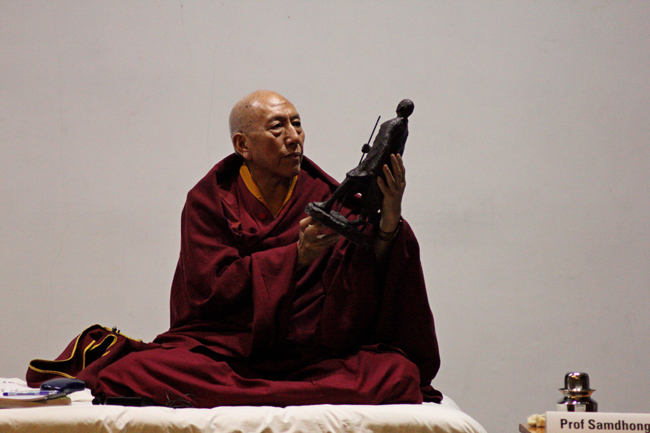 Venerable Prof Samdhong Rinpoche, Former Prime Minister of Tibetan Government in Exile appreciates the replica of Dandi Gandhi statue by Shri Sadashiv Sathe, during the Dandi Marchers' Sculptures Workshop II Lecture on December 21, 2013 at IIT Bombay.