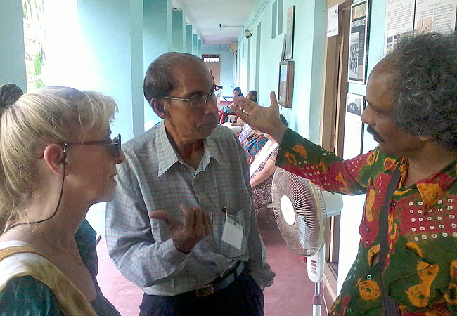 Sylvie Bantle and Alexander D from Munich, Germany in conversation with Suresh Babu (Centre), Director of Holistic Foundation during the 17th Wellbeing Medical camp at Kochi, Kerala organised jointly by the Men-Tsee-Khang and Friends of Tibet (Kerala) from February 8-11, 2012. Suresh Babu spends days with the Wellbeing camp voluntarily offering his skills and expertise. He sees heath through Tibetan medicine as a panacea to the allopathic addiction. We call him a 'strategist' as he is able to solve many of our problems with broad mindedness. (Photo: appu.john@friendsoftibet.org)