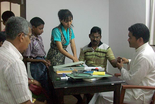 Dr Dorjee Rapten Neshar, Chief Medical Officer of Bangalore branch clinic of Men-Tsee-Khang conducting Pulse Diagnosis during the Men-Tsee-Khang medical camp at Kochi on October 13, 2010.