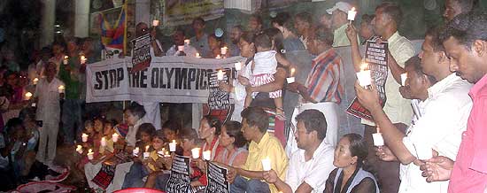 Kerala: A Candle Light Vigil organised by Friends of Tibet, Design & People, Human Rights Law Network (Kerala), Periyar Riverkeeper, Kashi Art Gallery and World Tibet Day at the Theresa Square, Ernakulam on April 17, 2008. These organisations were protesting the �Olympics Torch of Shame� which was on the Indian Soil on Thursday, April 17, 2008. (Photo: Design & People)