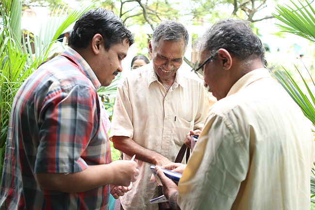 During the Wellbeing camp, Rajsankar's day begins at 3 in the morning. He coordinates between patients from his region and those who are newly registered with the Wellbeing team at Kochi. Many of them travel by train or by hired vehicles to save on travel expenses. They travel for more than three hours by road to reach Kochi to participate in the Wellbeing Camp organised jointly by Men-Tsee-Khang and Friends of Tibet. And it usually takes almost one and half day to consult the doctors for the entire team members from Ottapalam.