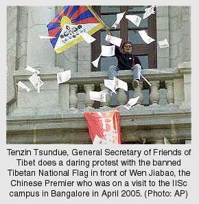 Tenzin Tsundue, General Secretary of Friends of Tibet does a daring protest in front of the Chinese Premier who was on a visit to IISc Building in Bangalore in April 2005.