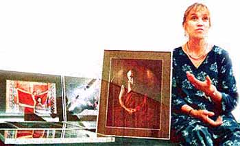 Diane Barker with some of her photographs