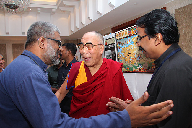 Pointing at the Amdo Province in the Map of Tibet, His Holiness the Dalai Lama with all his wisdom and sense of humour told Sethu Das who escorted him to the exhibition hall: 'This is the region where I was born, But China does not consider Amdo a part of Tibet...then I am not a Tibetan!' His Holiness was in Kochi to address a gathering of 'Friends of Tibet' members and 'Wellbeing' Beneficiaries at the Holiday Inn on November 25, 2012. The Dalai Lama spoke about 'The Art of Happiness' at this event organised by the 'Friends of Tibet Foundation for the Wellbeing'.