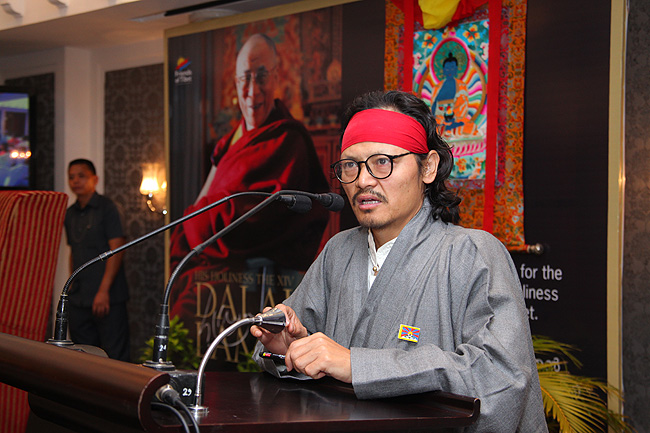 Tibetan Poet and Activist Tenzin Tsundue presents the documentary film 'Compassion in Exile'. The Dalai Lama of Tibet spoke to a gathering of 'Friends of Tibet' members and 'Wellbeing' beneficiaries at the Holiday Inn Cochin on November 25, 2012. His Holiness spoke about 'The Art of Happiness' at a function organised by the 'Friends of Tibet Foundation for the Wellbeing'.