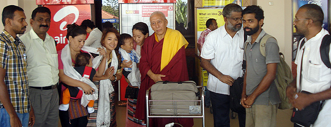 Prof Samdhong Rinpoche, Former Kalon Tripa or the Chairman of the Cabinet of the Tibetan government-in-exile in India is being received by Friends of Tibet Campaigners and Kochi local Tibetans on his arrival at Kochi International Airport on October 5, 2011. Martin, VJ Jose, Sethu Das, Abdul Nassar and Yeldho Mathew are seen. (Photo: Anand V)