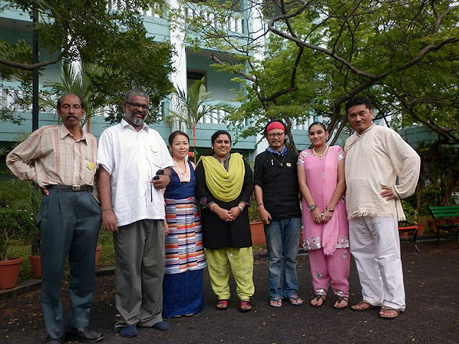 Sumithra Sathyan of DC Books with Wellbeing team members - Suresh Babu, Sethu Das, Dr Chenga Lhamo, Tenzin Tsundue, Aishwarya Sathyan and Dr Dorjee Rapten Neshar during the 28th Wellbeing Tibetan Medical Camp in Kochi organised jointly by the Men-Tsee-Khang and Friends of Tibet Foundation for the Wellbeing from May 8-11, 2013.
