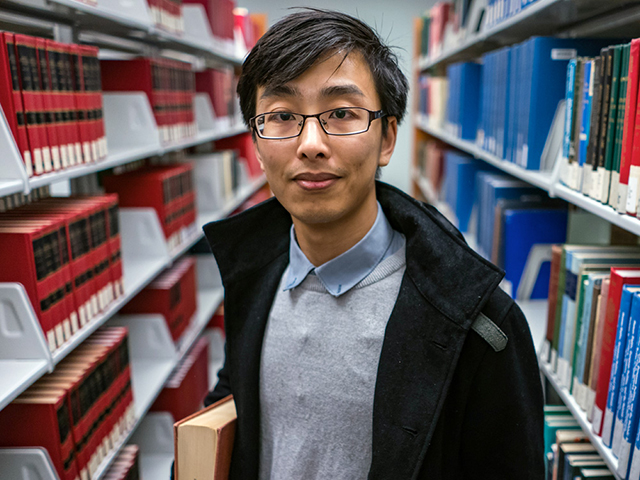 Shawn Zhang, a Peking University alumnus who came to Canada on a student visa two years ago to study law at UBC. (Photo: John Lehmann for Postmedia News)