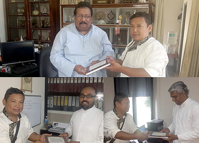 Shri Namgyal Tsundu presenting Handmade Tibetan Notebooks to the members of the management of St. Albert's College, Kochi, Kerala on World Tibet Day. (Top) Prof Harry Cleetus, Principal, St Albert's College; (Left) Rev Fr Christy Pathiyala, Assistant Manager, St. Albert's College and (Right) Rev Fr Antony Anackal, Manager, St. Albert's College.