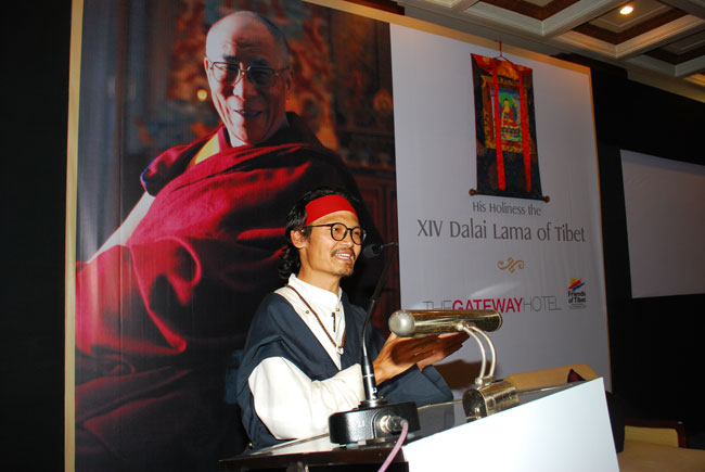 Noted Tibetan poet-activist Tenzin Tsundue introduces the documentary film 'The Sun Behind the Clouds: Tibet's Struggle for Freedom' by Ritu Sarin and Tenzing Sonam at The Gateway Hotel of Taj, Marine Drive Ernakulam on September 04, 2010. The film was screened to the public in connection with the first visit of His Holiness the Dalai Lama of Tibet to Kochi.