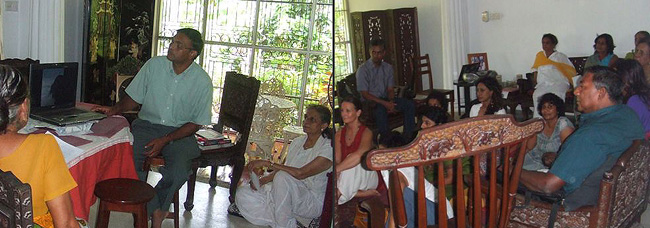 Ravindra Ranasinha (Left) with the power point presentations on Tibet during the Tibet awareness programme in Sri Lanka on March 19, 2011 organised jointly by the Enlightenment Seeker's Study Circle and Friends of Tibet (Sri Lanka).