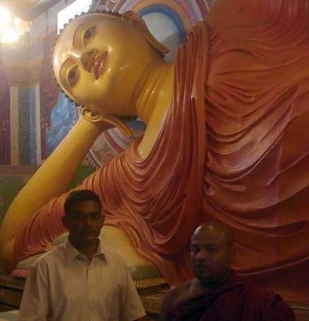Ravindra Ranasingha (Left)with the main priet of Sree Saddharma Raja Vihara of Moratuala, Sri Lanka