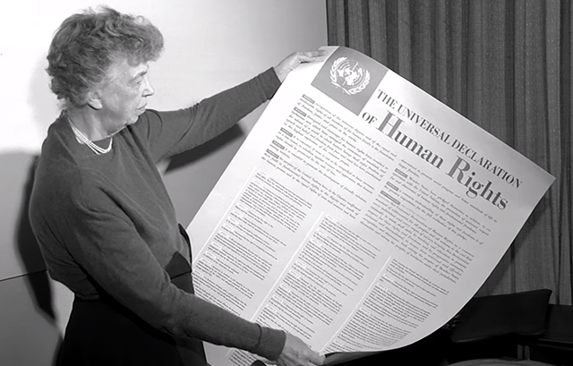December 10, 1948: United Nations adopts Universal Declaration of Human Rights. Anna Eleanor Roosevelt, longest-serving First Lady of the United States and Chair of the UN Human Rights Commission, holds the historic Universal Declaration of Human Rights, which includes Franklin Roosevelt's Four Freedoms.