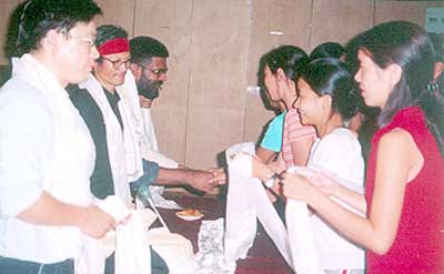 Lawrence Liang of Alternative Law Forum (left), Tenzin Tsundue, Sethu Das and CA Kallianpur of Friends of Tibet are being welcomed at the Tibetan Youth Hostel, Bangalore.