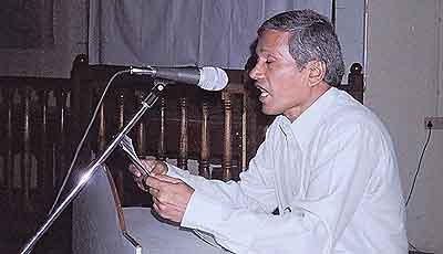 CA Kallianpur of Friends of Tibet speaks to the gathering on March 10, 2006