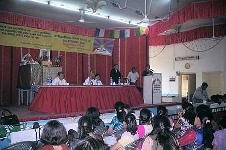 Tenzin Tsundue speaks to the gathering in Bombay on December 10, 2006.