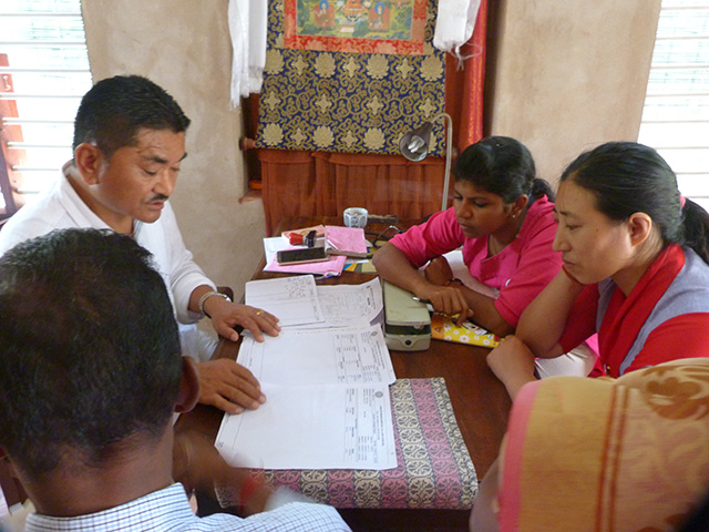 Dr Dorjee Rapten Neshar, Dr Jyoti S and Dr Tsering Dolma giving medical advise to a Wellbeing Participant during the 58th Wellbeing Tibetan Medical Camp at Alappuzha.