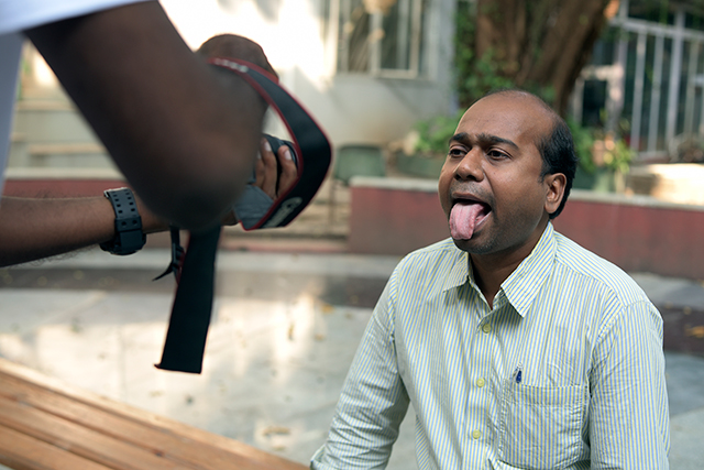 Tongue Analysis/reading at Wellbeing camp. Photo: Siddharth Aderath