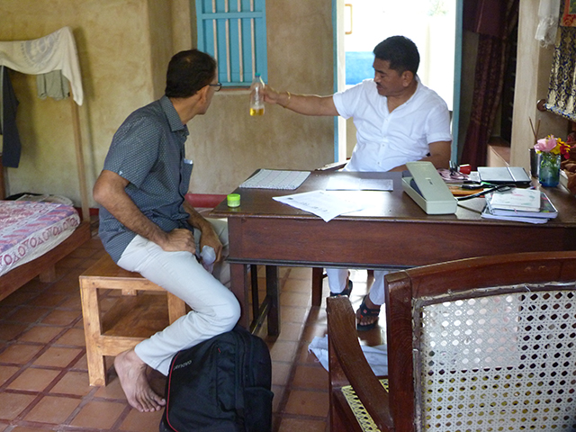 Traditionally, the health diagnosis of the participant is usually done by the Tibetan doctors through the analysis of the pulse; quality and flow of the urine and from the reading of the tongue of a patient. In the photograph, Dr Dorjee Rapten Neshar, Chief Medical Officer of Men-Tsee-Khang is seen looking at the urine of a Wellbeing participant in the early hours of January 9, 2020. Participants whose urine analysis required are requested to come early in the morning by the Tibetan doctors.